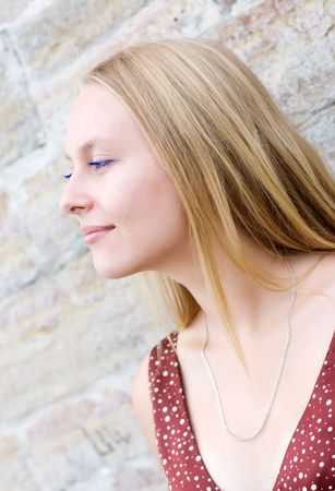 Summer portrait of the beautiful fair-haired girl の写真素材