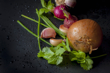 fresh red onion isolated on Black background (onion)の写真素材