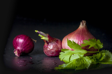 fresh red onion isolated on Black background (onion)の写真素材