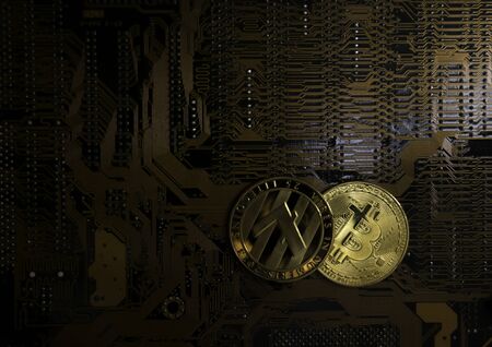 Bitcoin golden coin on computer circuit board