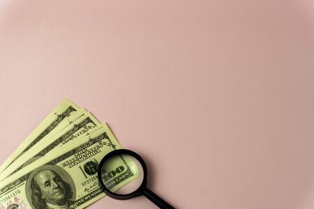Top view of bundle of 100 dollar bill on colorful backgound. Business concept with copy space.の写真素材