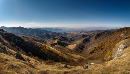 Majestic mountain range, tranquil meadow, panoramic landscape, beauty in nature generated by artificial intelligenceの素材