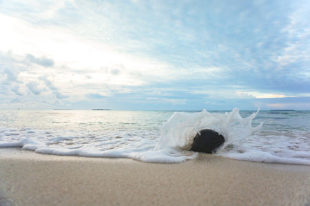 Rock hit by the wavesの写真素材