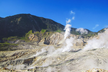 Hot smoke from the mountains craterの写真素材