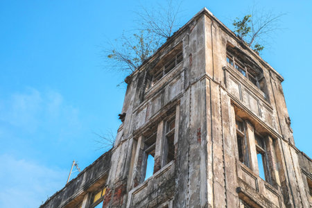 Abandoned building with blue sky