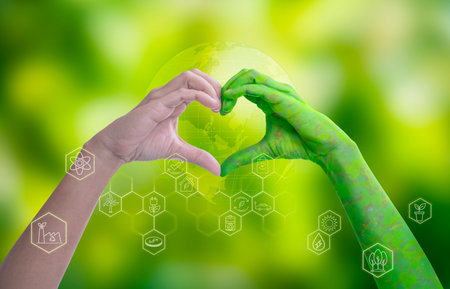 Environment earth day, Heart shaped by nature hands and female with circular economy icon of eco infinity , Loving the environment, Forest conservation concept, Concept Save the world.の写真素材
