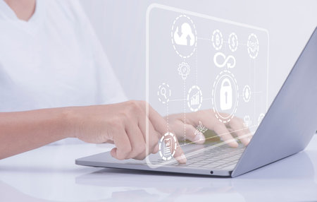 Businessman using a computer  with cloud computing diagram show   graphic iconon  for security lock...