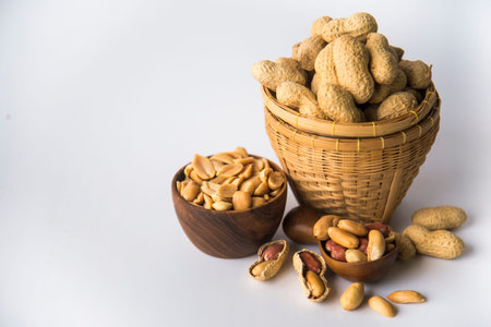 Peanuts in basket a collection of whole peanuts in their shells and a few without shells,healthy...