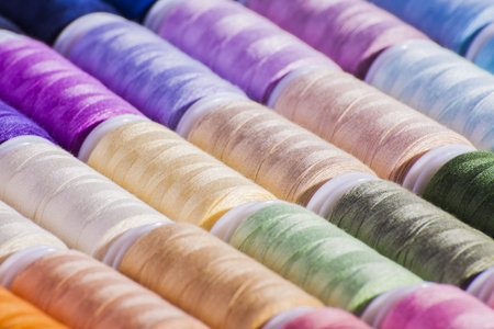 Multicoloured cotton reels used in arts, crafts and textile industries,