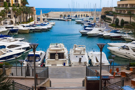 Luxury yachts in Maltese harbour showing wealth and prosperityのeditorial素材
