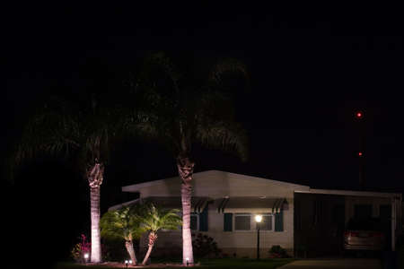 Decorative landscape lighting in front lawn of retirement homeの写真素材