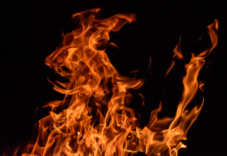 Fire flames on black backgroundの写真素材