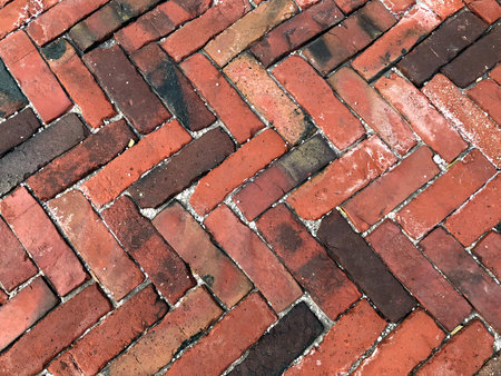Brick texture. City sidewalk background. Abstract stone brick pattern. The texture of the sidewalk...