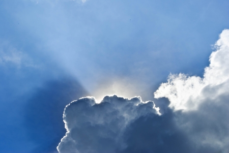 blue sky with sun and beautiful clouds の写真素材