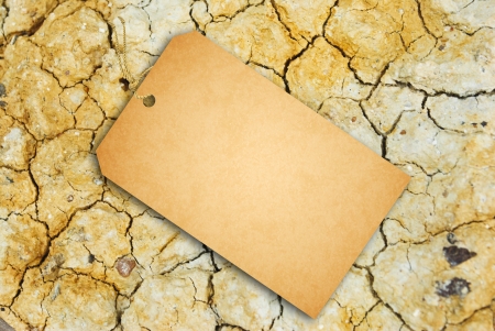 Sale Tag on Dry soil textureの写真素材
