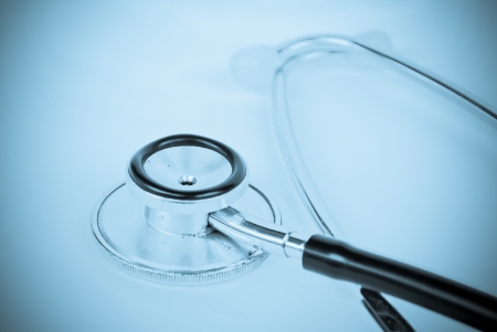 A stethoscope in front of medicalの写真素材