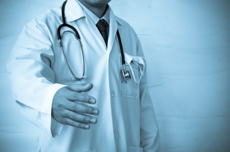Close up of a doctors lab white coatの写真素材