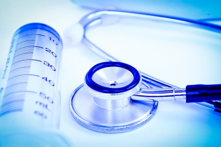 A stethoscope in front of medicalの写真素材