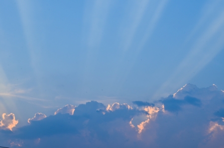 blue sky with sun and beautiful cloudsの写真素材