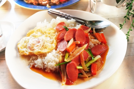 Breakfast fried rice with hot dog, fried eggの写真素材