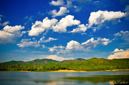 Blue reflection in river at summer forest, Thailandの写真素材
