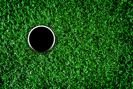 Golf course hole with artificial grass.の写真素材