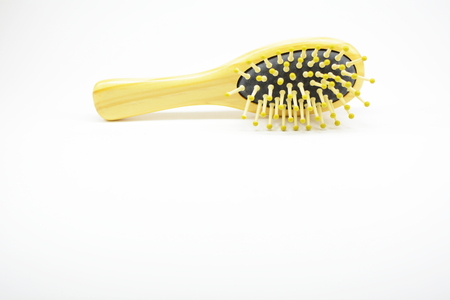 Hair loss, hair fall everyday serious problem, on white background.の写真素材