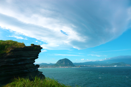 It is a wonderful view of Sanbangsan and clouds in Jeju.の写真素材