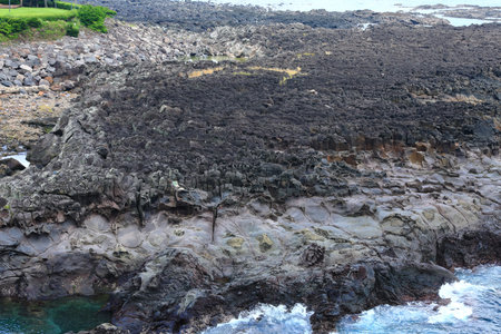 It is a beautiful summer landscape of the coast of Jeju Island.の写真素材