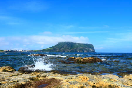 It is a beautiful scenery of Seogwipo coast in Jeju Island called Gwangchigi Beach.の写真素材