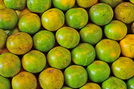 Orange fruit on the market. fresh oranges ready to eatの写真素材