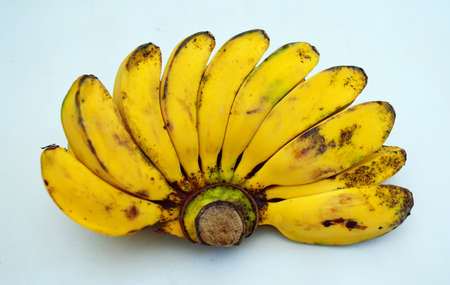 Banana - Ripe bananas against a white background, Ripe yellow bananasの写真素材