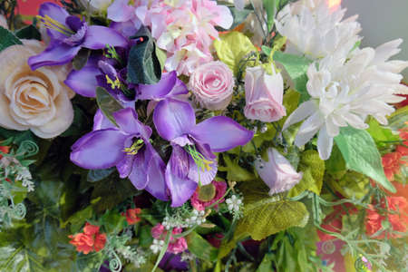 Synthetic flowers for decoration. Decoration flowers for weddings, Plastic flowers for wedding decorationsの写真素材