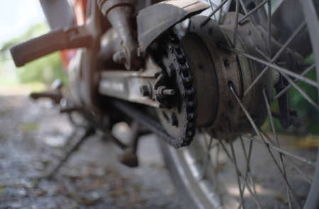 Close up details of the motorcycle chain from behindの写真素材