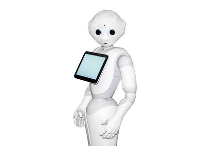 White robot on a white background with a tabletの写真素材