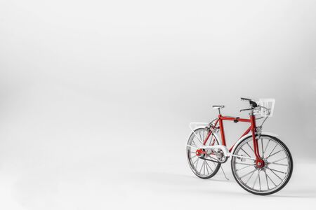 Red bicycle on a white background.の写真素材
