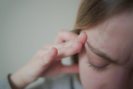 close up of woman with headache
