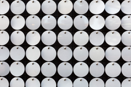 Background consisting of small white circles in several rows
