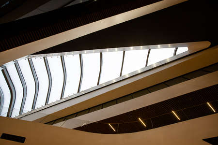 Milan, Italy, March 2020. Glass modern railing in a shopping center or business office. Large glass canvas.のeditorial素材