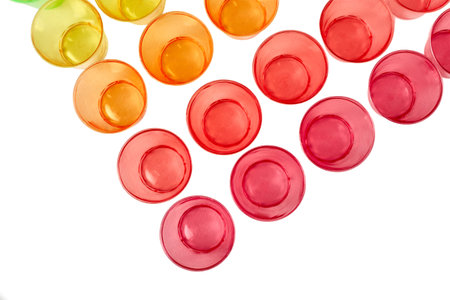 Multi-colored glasses for alcohol close-up. Recycled material. Caring for the environment.