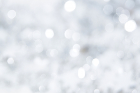 Abstract silver Christmas or holiday light backgroundの写真素材