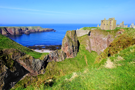 Scenic ruins of Dunnottar Castle along the coast of Scotlandのeditorial素材
