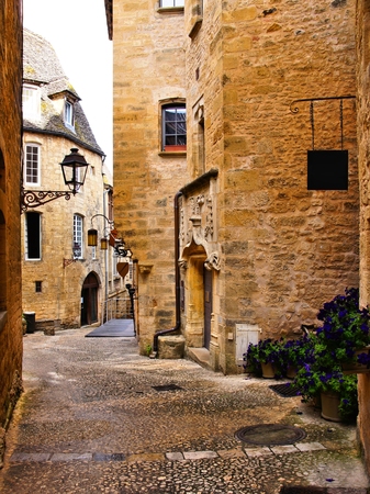 Medieval lane in the picturesque old town of Sarlat, Dordogne, Franceの写真素材