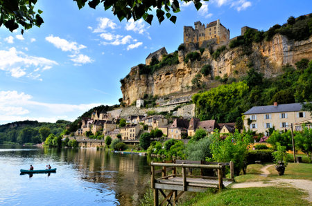 View of the beautiful village of Beynac et Cazenac with river reflections Dordogne, Franceのeditorial素材