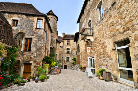 Picturesque medieval street the beautiful Dordogne village of Carennac, Franceの写真素材