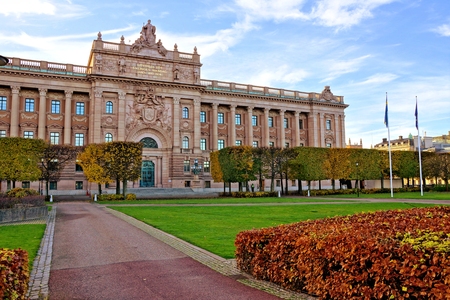 View of the Swedish Parliament building, the Riksdag and old town under blue skies during autumnのeditorial素材