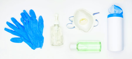 Coronavirus prevention equipment and sanitizer set on a white background