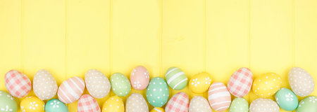 Easter bottom border with modern farmhouse cloth and pastel eggs over a yellow wood banner...