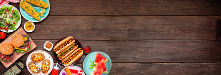 Summer BBQ food corner border. Hamburgers, hot dogs, potatoes, corn and cold treats. Top down view...