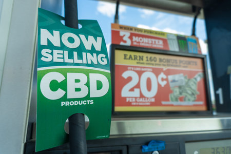 Sign advertising the sale of CBD products at a gas station